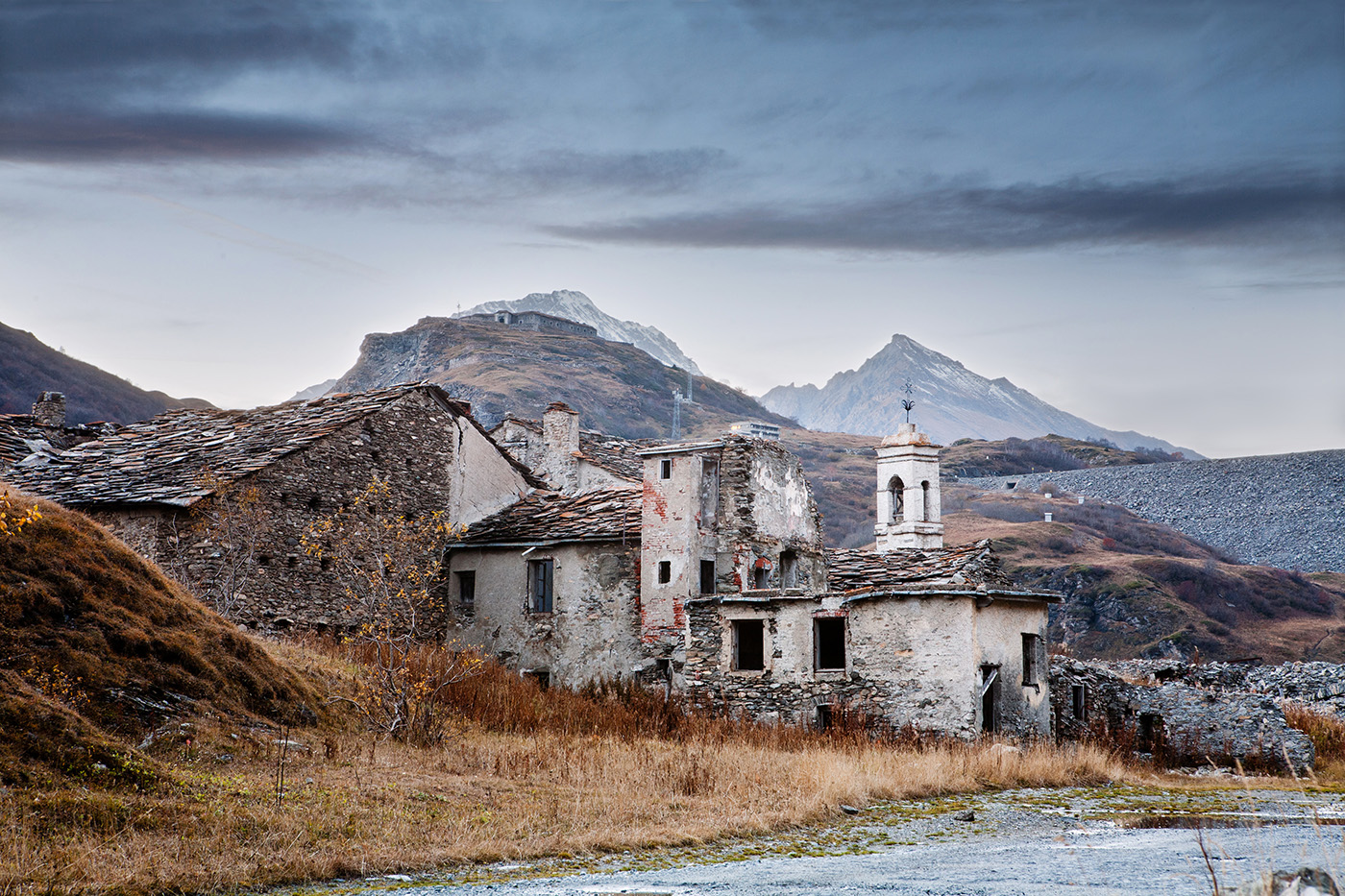Ruins of old stone village in Italian Alps